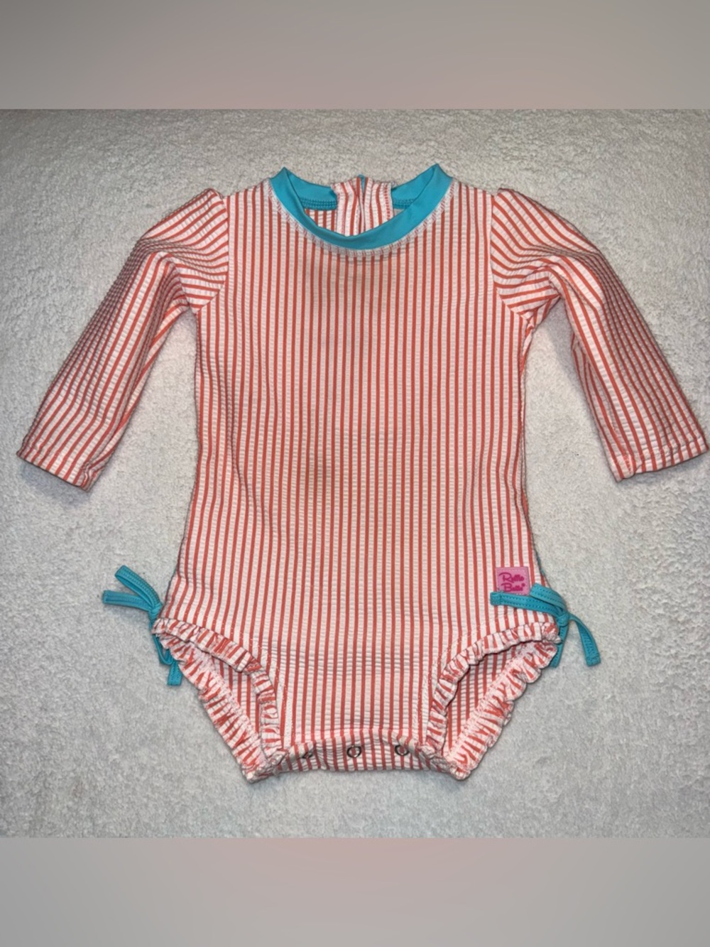 Rufflebutts toddler seersucker long sleeve rash guard swimsuit, size 6-12 mos